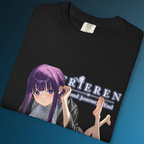 Close-up anime artwork of Fern in a lying pose with exposed soles and a magical expression, printed vividly on a dark background tee.