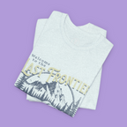 "Retro wilderness graphic tee featuring grizzly bear and alpine scenery"