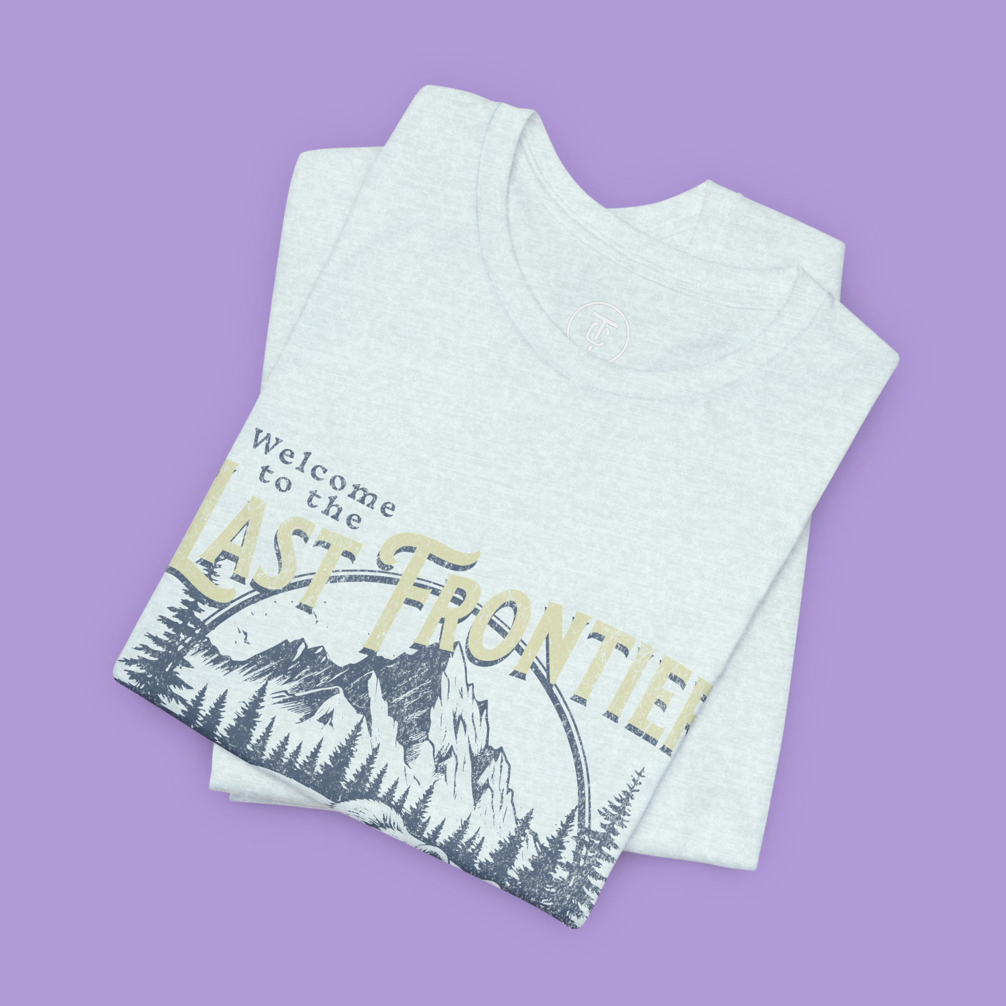 "Retro wilderness graphic tee featuring grizzly bear and alpine scenery"