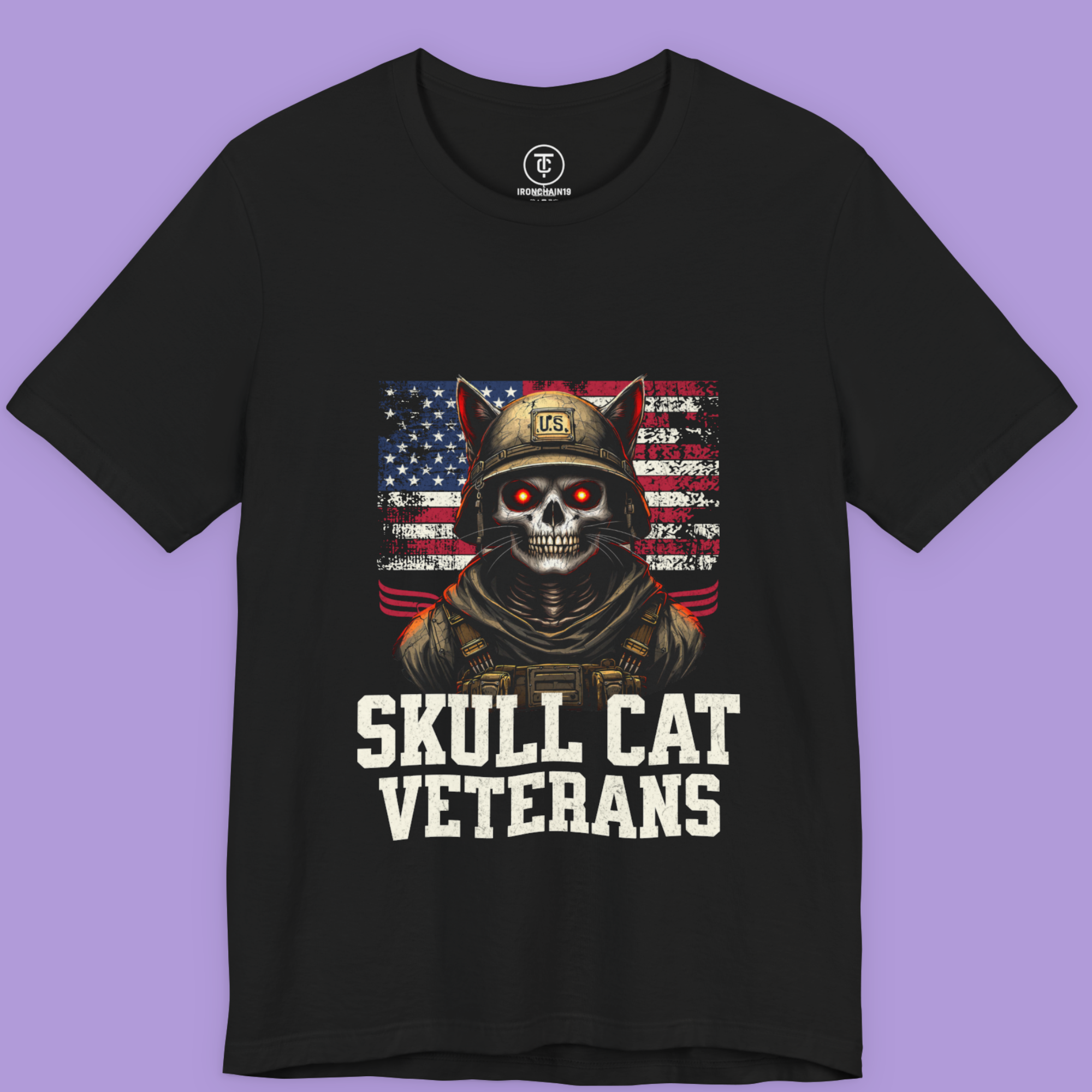 "Skull Cat Veterans T-shirt featuring a skull-faced cat soldier in a U.S. flag backdrop – patriotic gothic graphic tee on Bella+Canvas 3001."