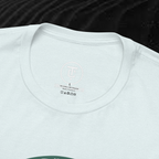 A close-up of the inside collar of a  cotton t-shirt from Ironchain 19. The tagless printed label features a sleek white logo with a chain illustration, surrounded by number19 . Below the logo, the text indicates the shirt is 100% cotton, made in Bangladesh, and includes washing care symbols. The soft fabric and seamless neckline highlight the premium quality and comfort of this Gothic aesthetics  perfect for cat lovers and fans of modern streetwear fashion.