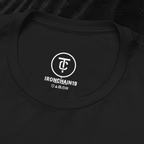 A close-up of the inside collar of a  cotton t-shirt from Ironchain 19. The tagless printed label features a sleek white logo with a chain illustration, surrounded by number19 . Below the logo, the text indicates the shirt is 100% cotton, made in Bangladesh, and includes washing care symbols. The soft fabric and seamless neckline highlight the premium quality and comfort of this Gothic aesthetics  perfect for cat lovers and fans of modern streetwear fashion.
