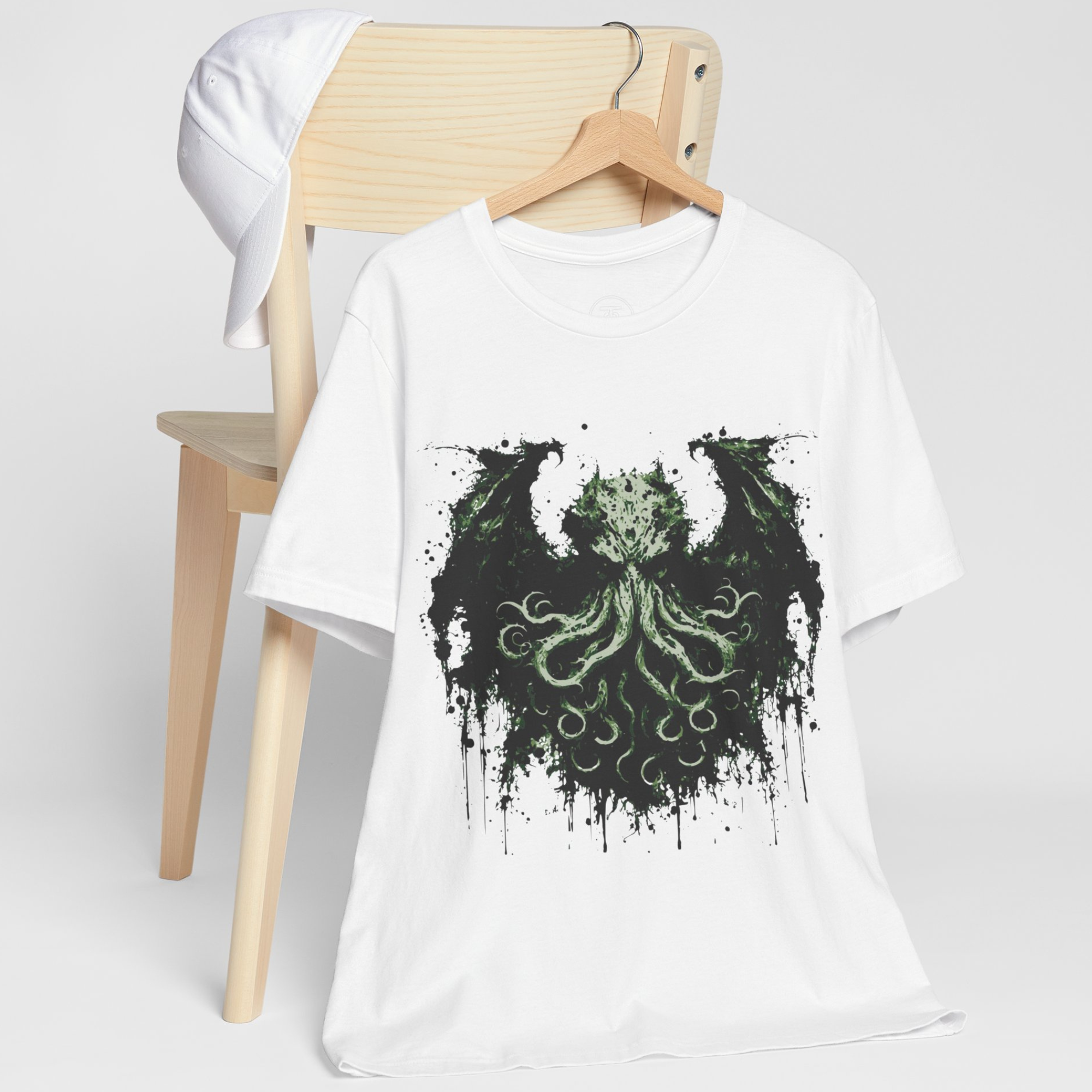 "Cosmic horror shirt with green tentacle monster design inspired by H.P. Lovecraft mythos"