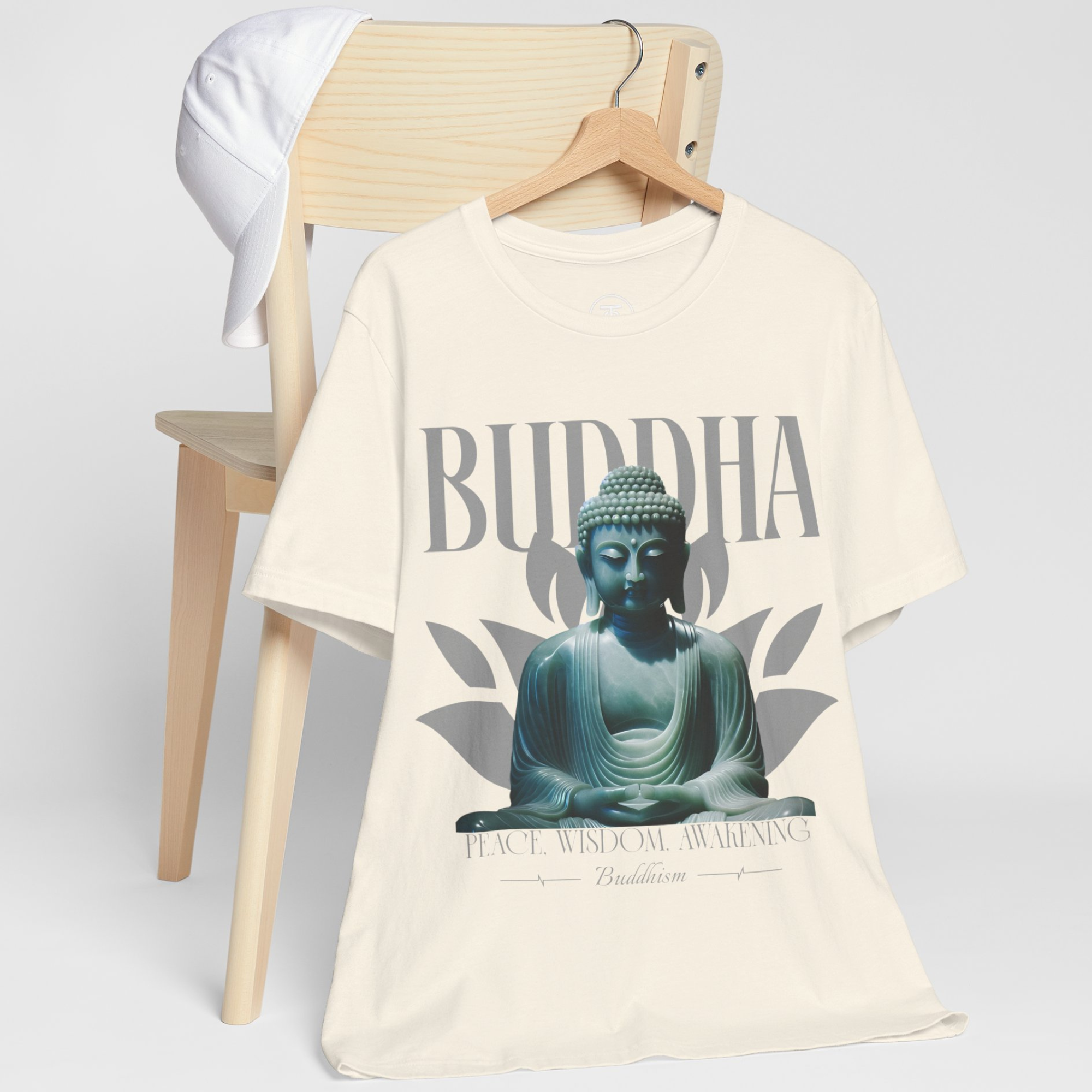 Close-up of Buddhism Apparel graphic showing the Buddha's meditative pose and serene face.
