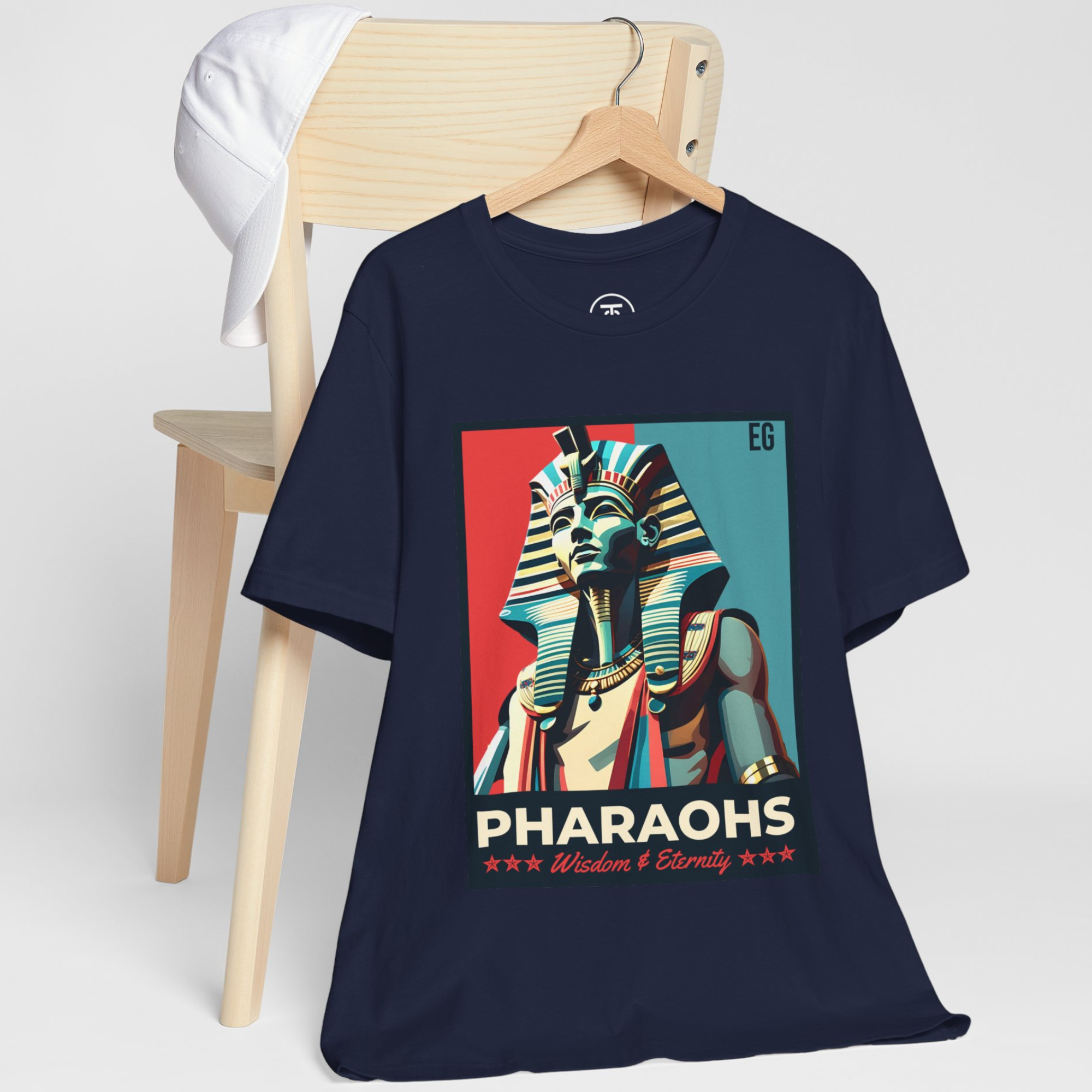 High-quality print of a Pharaohs graphic on a dark blue T-shirt background.