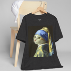 Detailed image of the Art Enthusiast T-shirt print with the cat's blue and yellow turban hangs on a chair.
