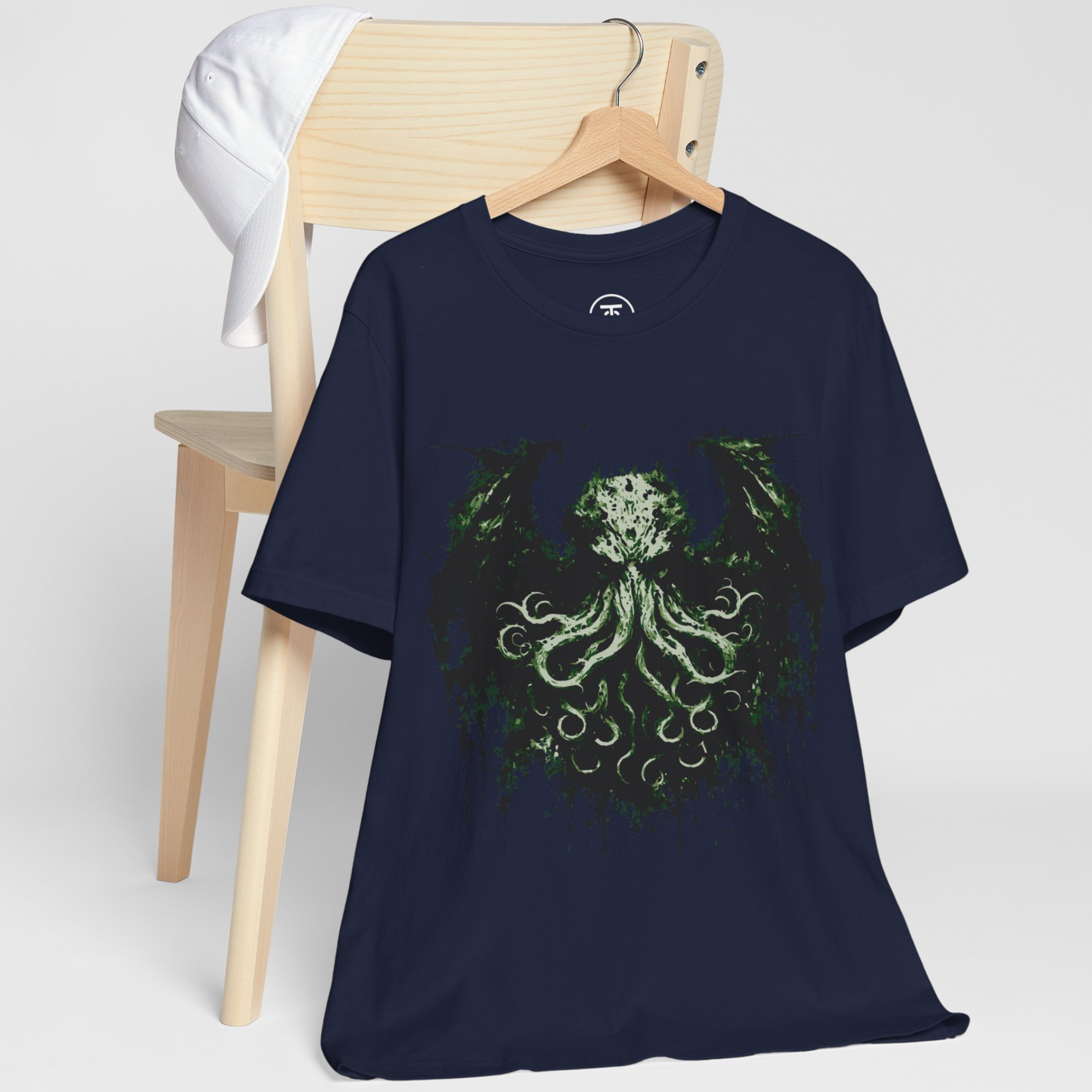 "Dark aesthetic horror tee featuring eldritch creature with wings and tentacles, perfect gift for fans"