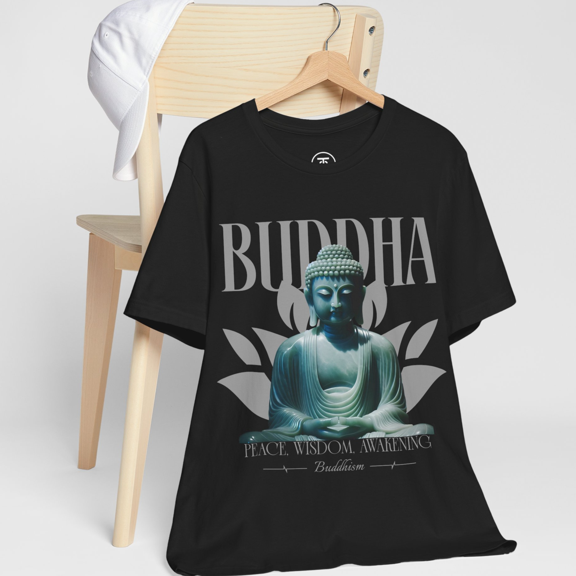 High-quality print of a black T-shirt featuring a Buddha statue in a modern graphic design.