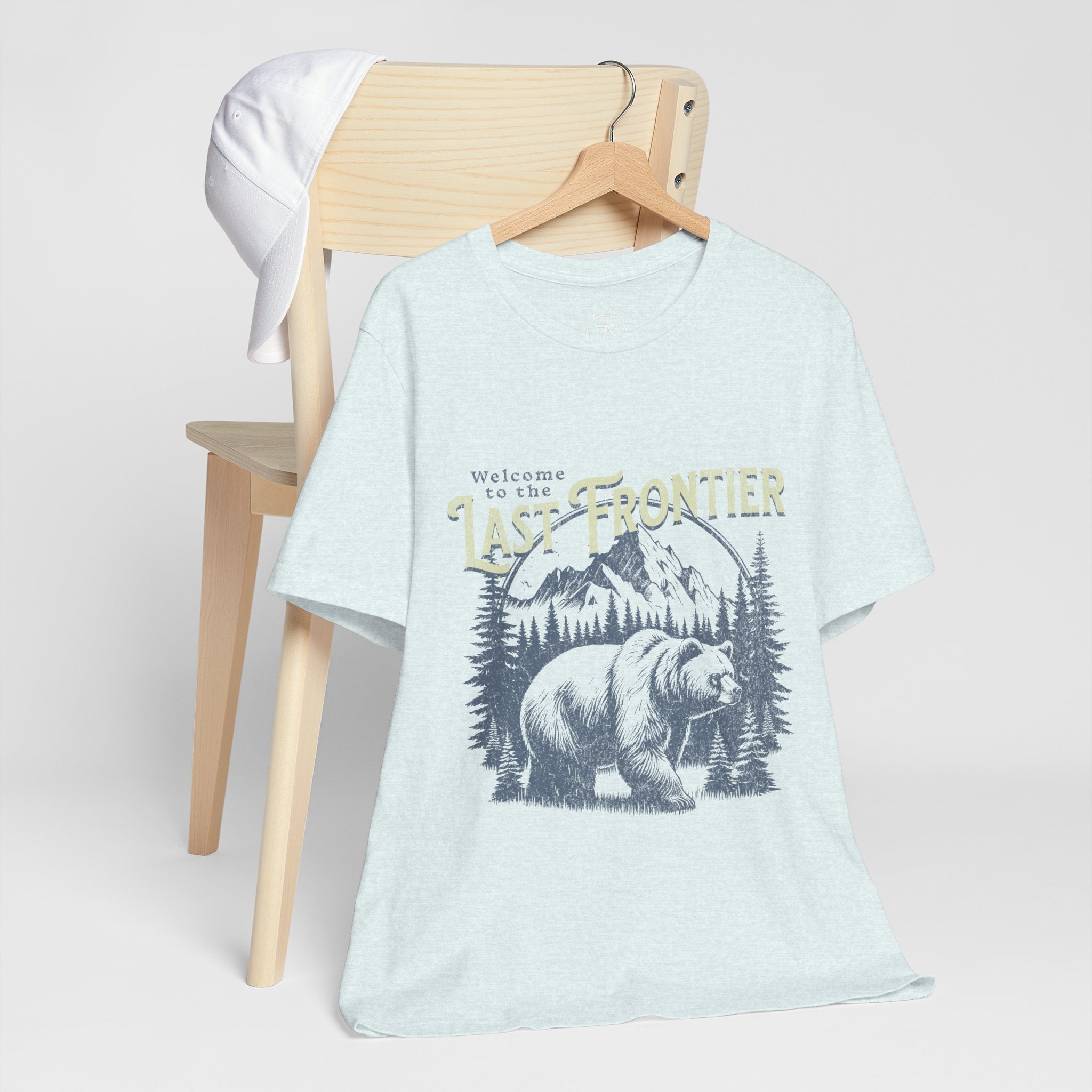 "Retro hiking and camping shirt with grizzly bear and mountain design"