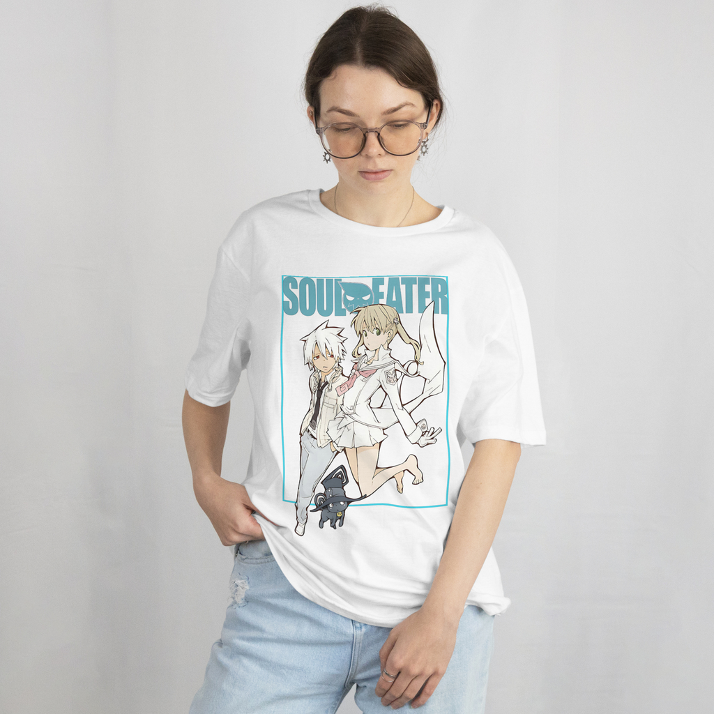 Soul Eater graphic tee in crisp white, showcasing anime heroes Maka and Soul in stylish line art.